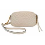 A Gucci Ivory GG Marmont Cross Body Bag. Quilted leather exterior with gold-toned hardware, chain