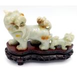 A Glorious Antique Chinese Hand-Carved Jade Fu Lion Figure - Sits on a bespoke lacquered wooden