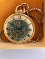 BULOVA CARAVELLE SKELETON POCKET WATCH. Finished in gold tone and complete with gold plated chain.