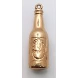 A 9K Yellow Gold Bottle Pendant/Charm. 3cm. 1.22g weight.