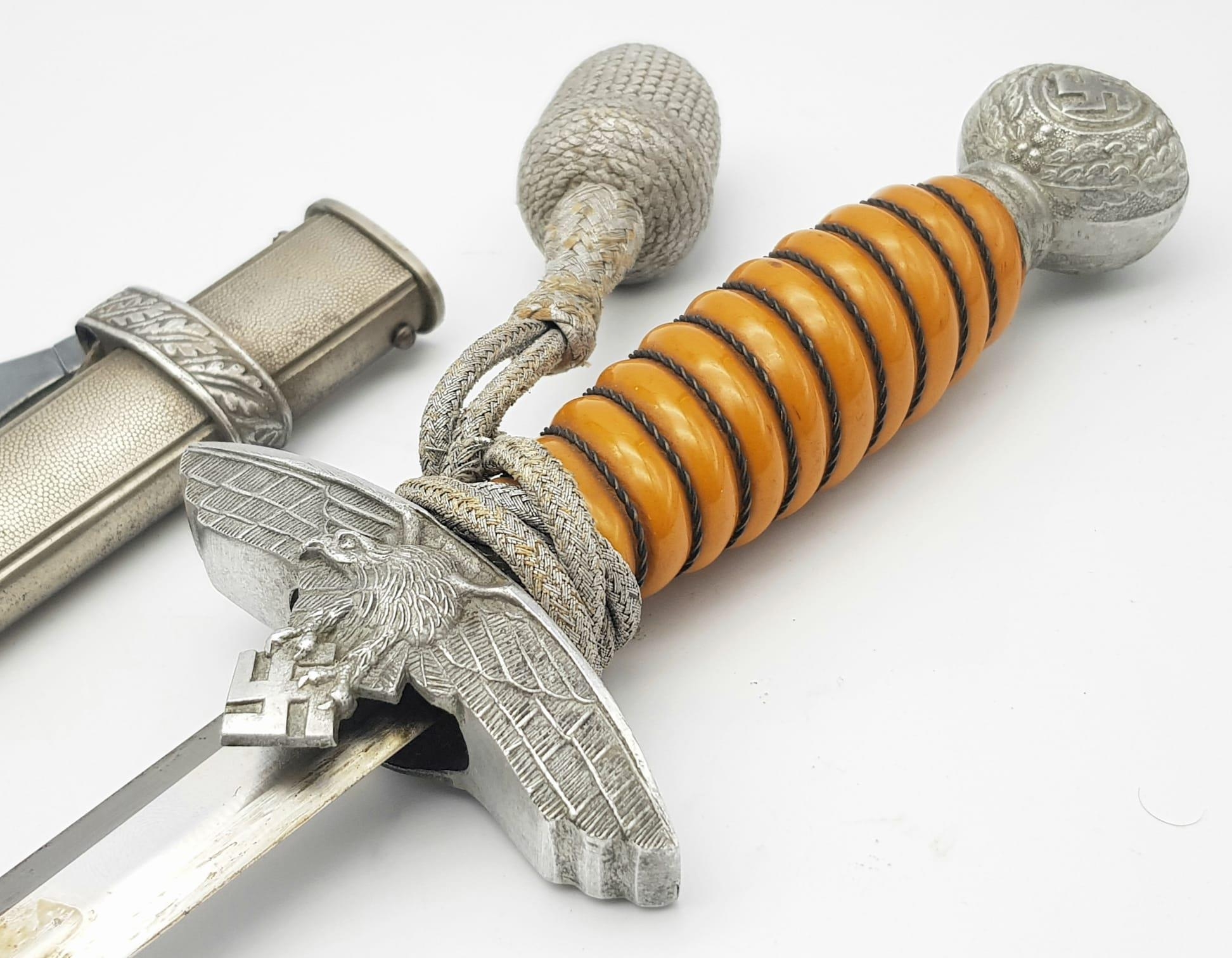 A WW2 German Nazi First Patten Luftwaffe Dagger with a Burnt Orange Grip. The dagger is by Rudolf - Image 3 of 9