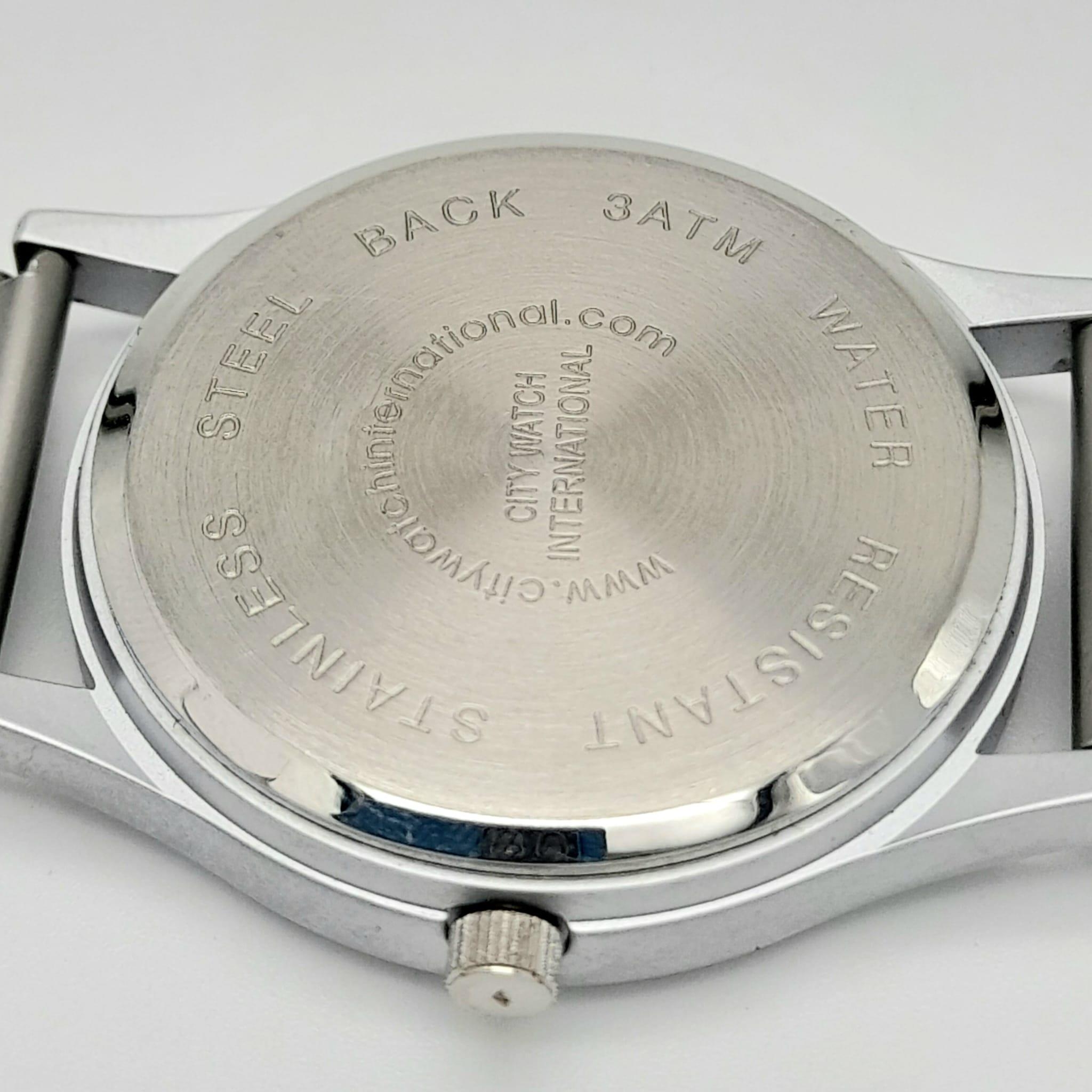 A MODERN "COBRA" BY CITY WATCH INTERNATIONAL , QUARTZ MOVEMENT ON A STAINLESS STEEL STRAP . 34mm - Image 8 of 12
