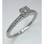 A 9K White Gold Diamond Cluster Ring. 0.15ctw, size L, 2g total weight. Ref: 8411