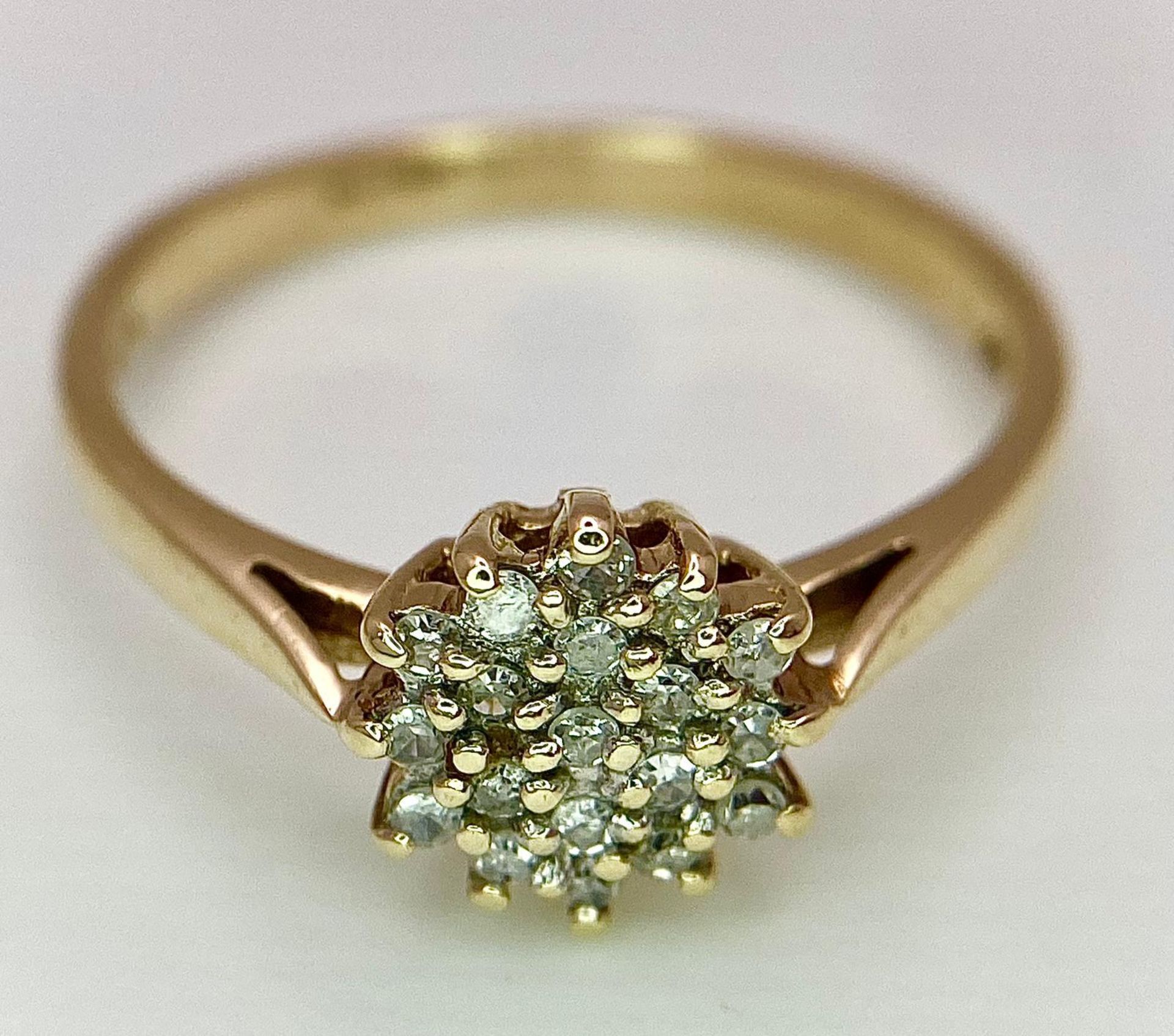 A 9K YELLOW GOLD DIAMOND CLUSTER RING. 0.15CT. 2.2G. SIZE P. - Image 7 of 13