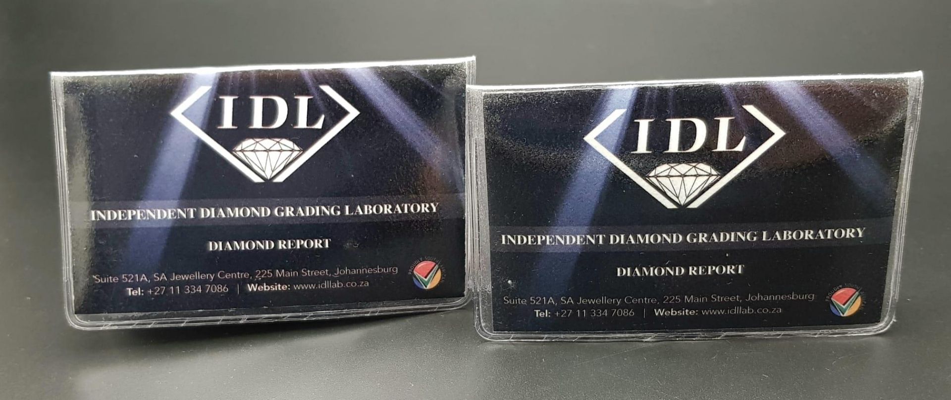 A top quality pair of brilliant cut diamonds, 0.402 carats each, with certificates from - Bild 10 aus 12