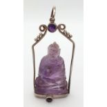 A Unique Vintage Amethyst Silver Mounted Buddha/Deity Pendant. The Carved Buddha measures 4.5cm Long