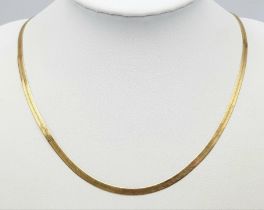 An Italian 9K Yellow Gold Herringbone Necklace. 40cm. 4.6g weight.