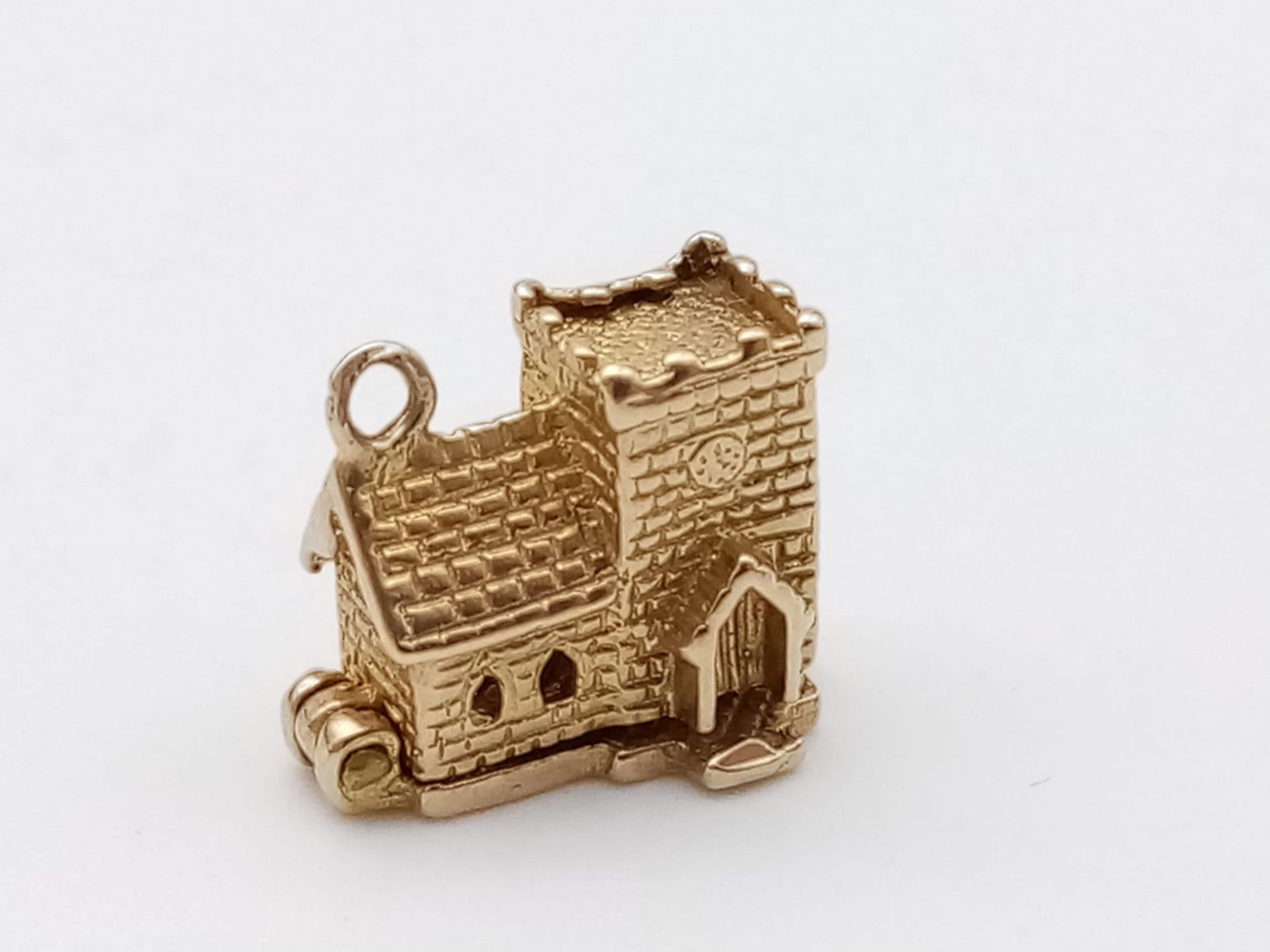 A 9K Yellow Gold Church Pendant/Charm, opens to reveal a wedding ceremony, 10mm. 2g