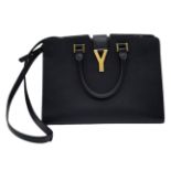 An Yves Saint Laurent Black 'Cabas' Handbag. Leather exterior with gold-toned hardware, two rolled