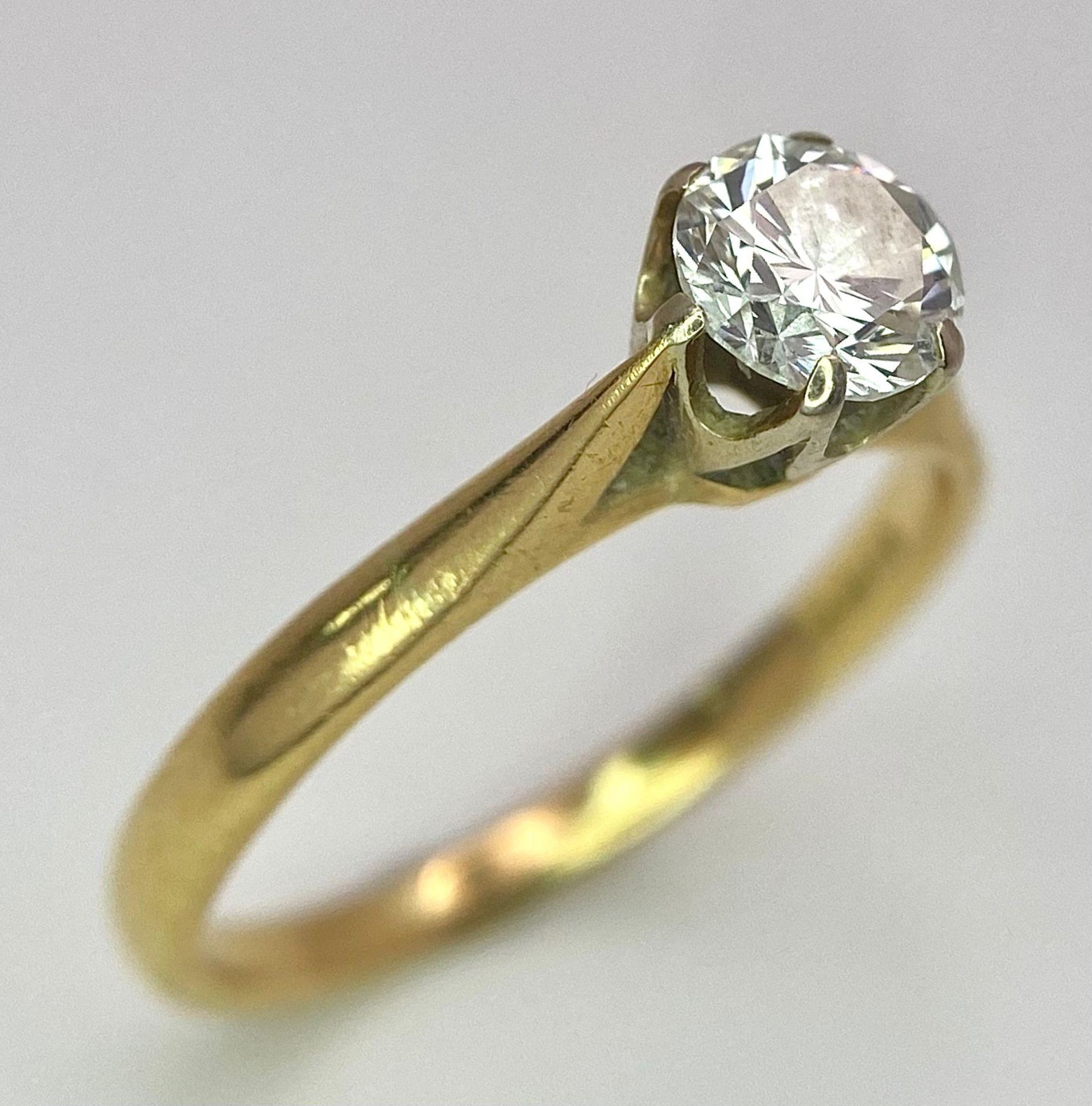 An 18K Yellow Gold Diamond Solitaire Ring. 0.75ct brilliant round cut diamond. Size N. 2.65g total - Image 3 of 6