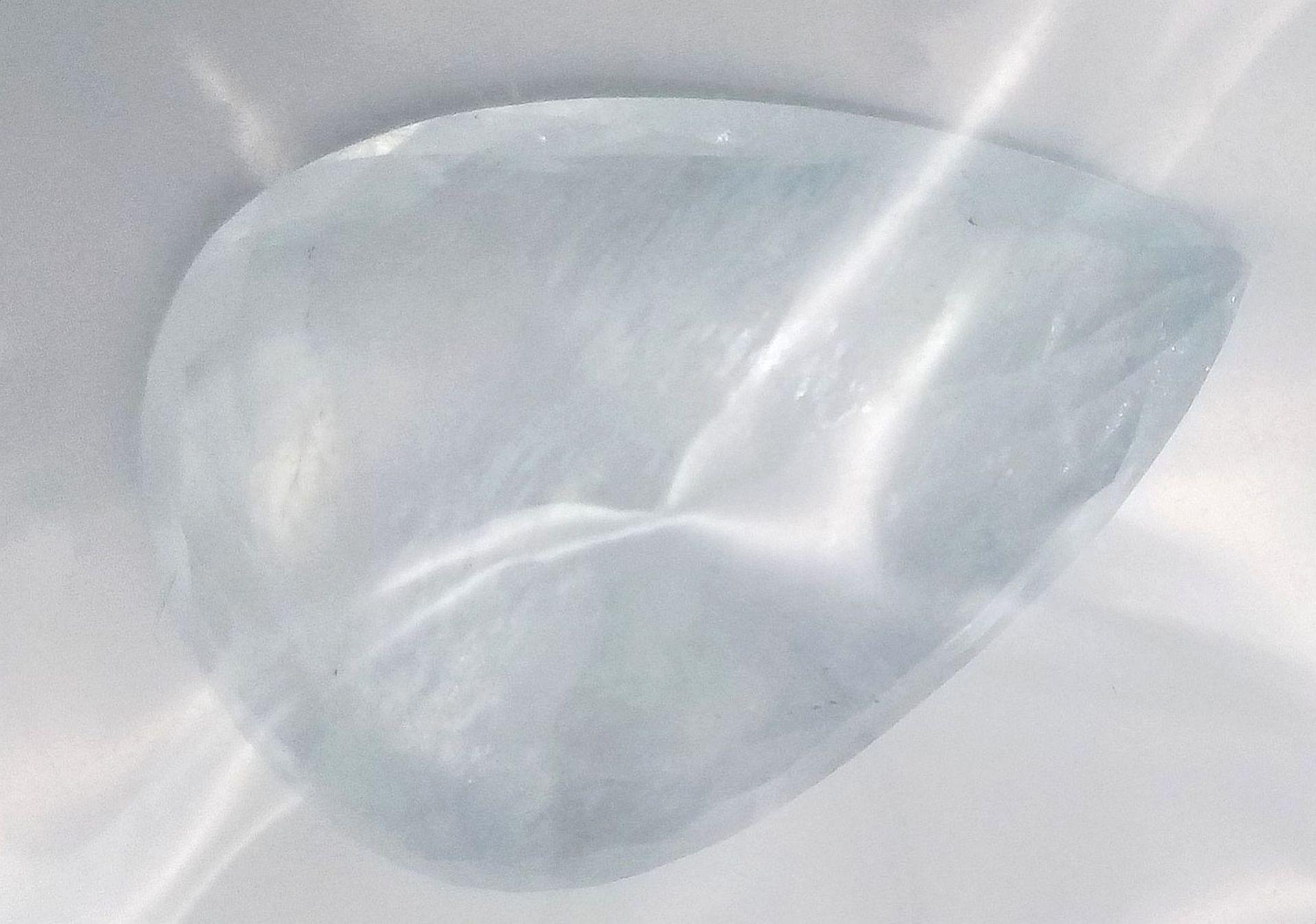 A 43.26ct Large Impressive Size Brazilian Natural Aquamarine, Pear Faceted. Comes with the AIG Milan - Image 2 of 4