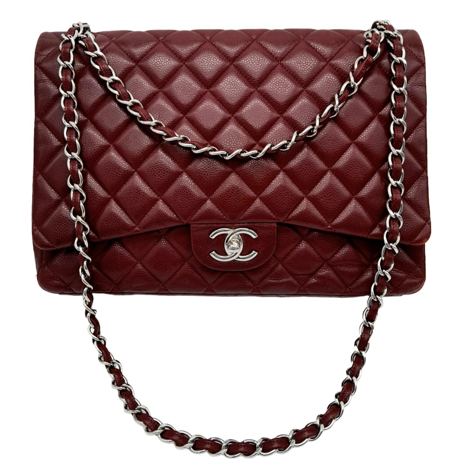 A Chanel Burgundy Jumbo Classic Double Flap Bag. Quilted leather exterior with silver-toned