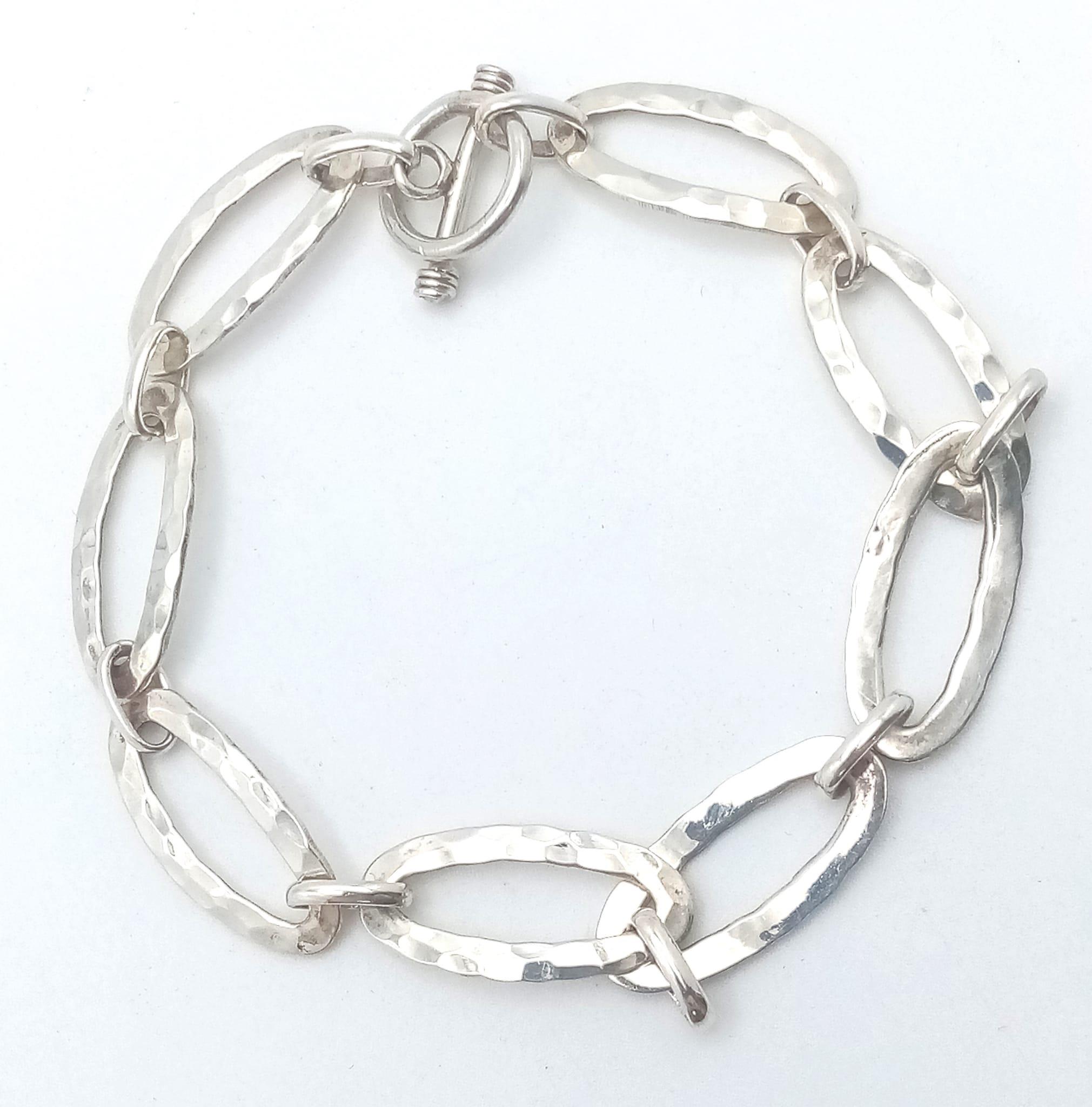 A 2013 London Hallmarked Sterling Silver Oval Link T. Bar Bracelet, 20cm Length. 9.07 Grams. - Image 3 of 7