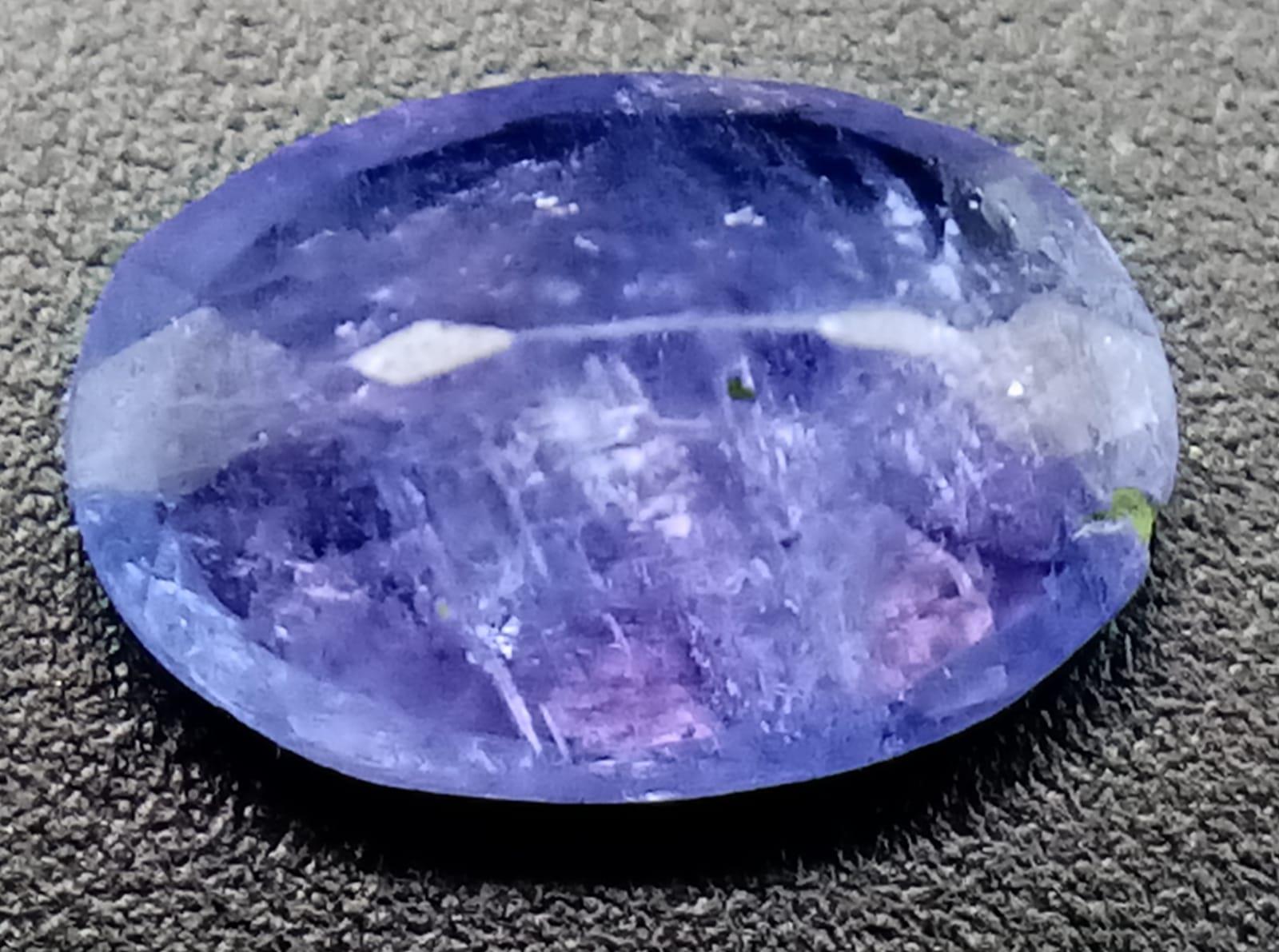 A 1.60ct Translucent Faceted Natural Tanzanite. Comes with the GGI Certificate. ref: ZK 030