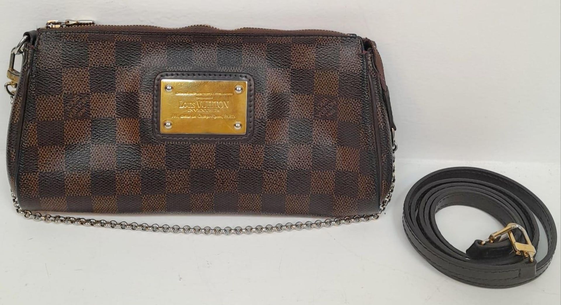 A Louis Vuitton Damier Ebene 'Eva' Pochette Shoulder Bag. Leather exterior with gold-toned hardware, - Bild 2 aus 6