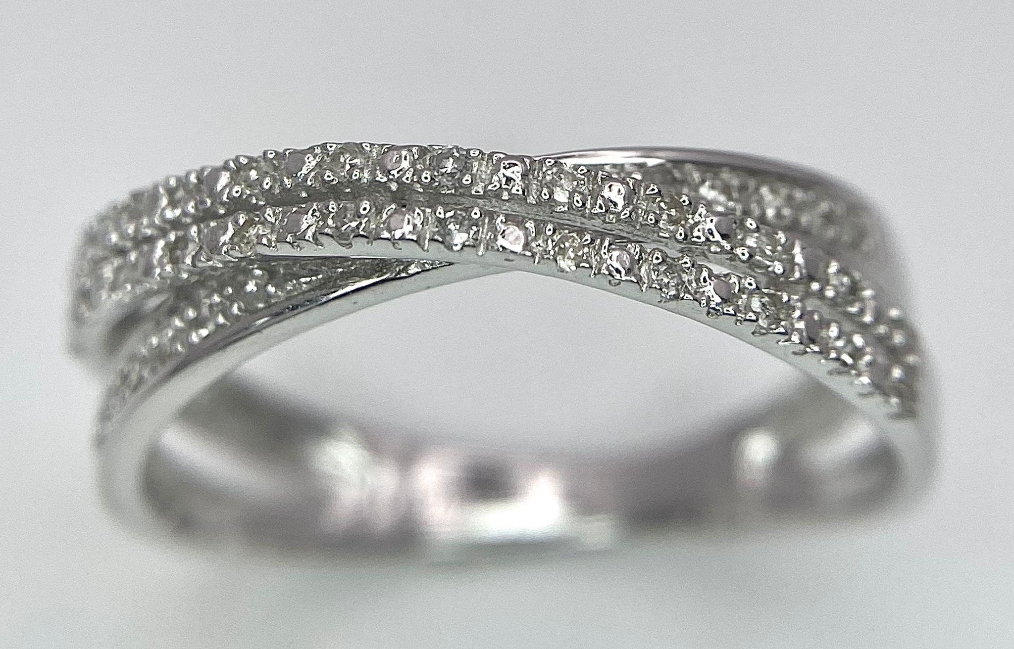 9K White Gold 3 Row crossover Diamond Ring, 0.25ct diamond weight, 2.5g total weight, size P - Image 2 of 6