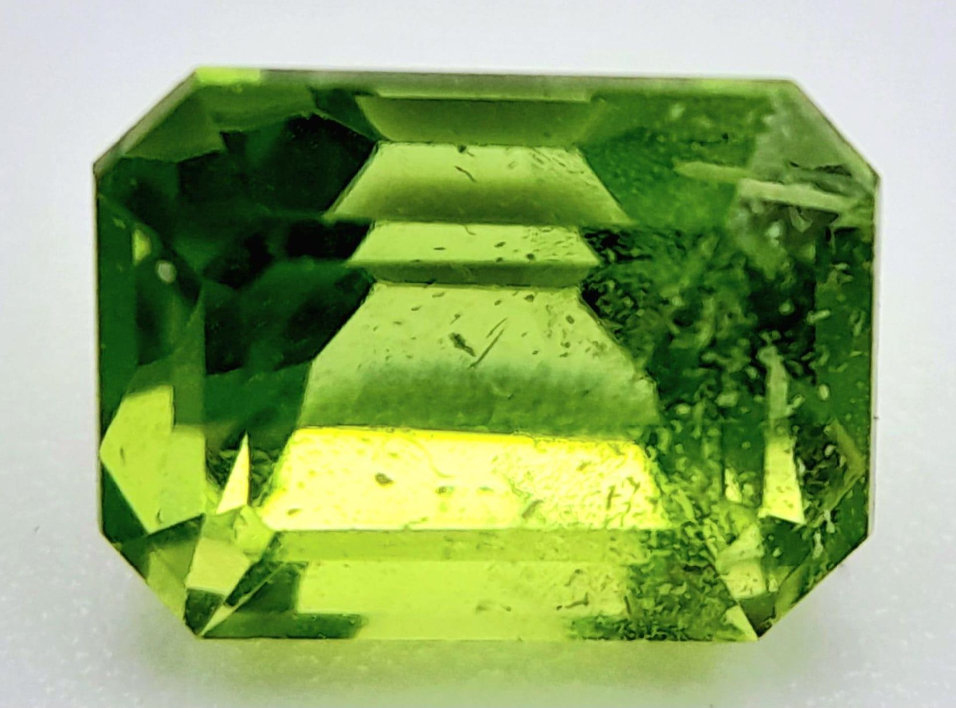 A 2.10ct Pakistan Natural Peridot Gemstone, Octagon shape. Comes with the GFCO Swiss Certificate.