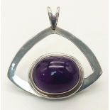 A Modernist Design, Sterling Silver, 2.4cm Length Oval Cut Amethyst Cabochon Pendant. The Pendant