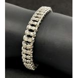 A 9K White Gold Diamond Tennis Bracelet. Two rows of 88 (total) diamonds! 18cm length. 15.3g total