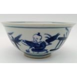 A Chinese blue and white hand painted bowl decorated with children playing with birds. White