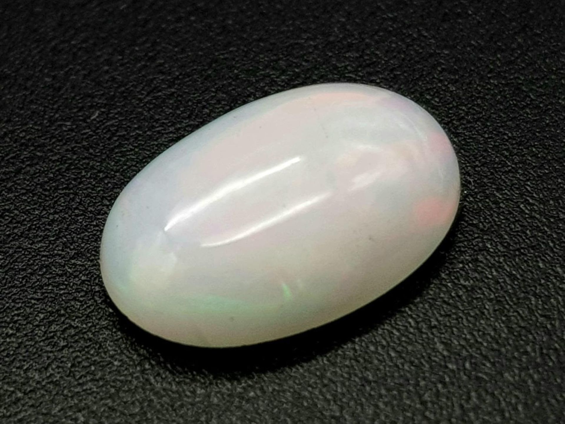 A 1.52ct Ethiopian Natural White Opal, in the Oval shape. Comes with the GFCO Certificate. ref: ZK - Image 4 of 6