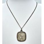 A vintage 925 silver St Christopher pendant on silver chain. Total weight 10.7G. Total length 53cm.