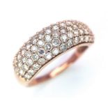A 9K Rose Gold Diamond Encrusted Ring. Five rows of 70 small cut round diamonds. Size N. 3.2g