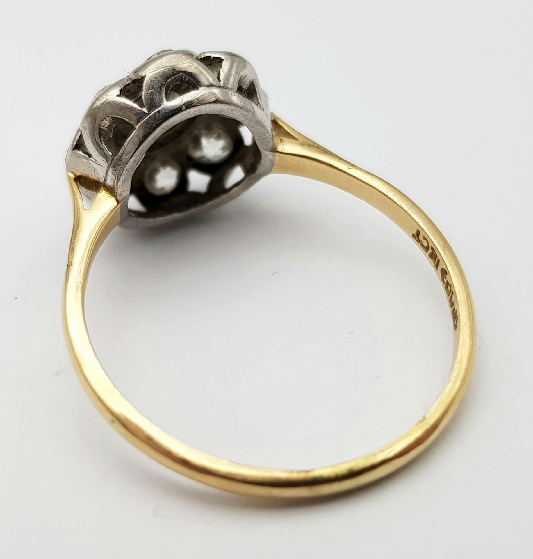 An 18 K yellow gold ring with a large diamond cluster, size: T, weight: 3.4 g. - Image 6 of 10