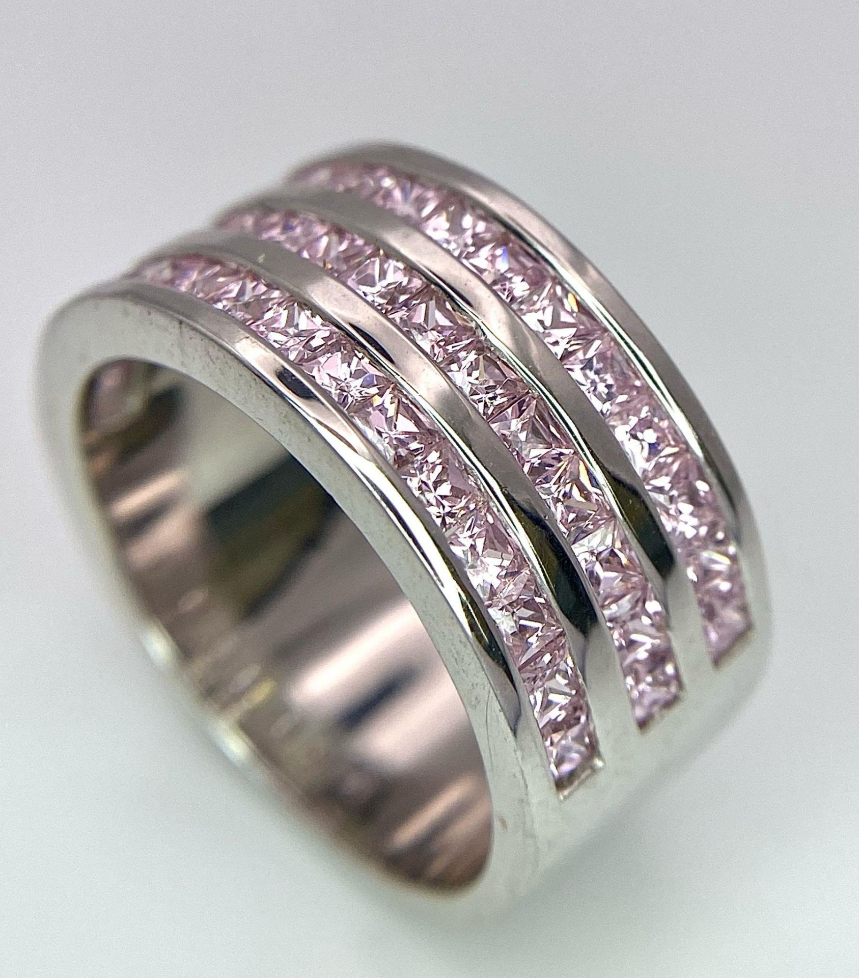 A Sterling Silver Pink Stone Set 3 Row Ring. Size Q, 9.5g total weight. Ref: 8325