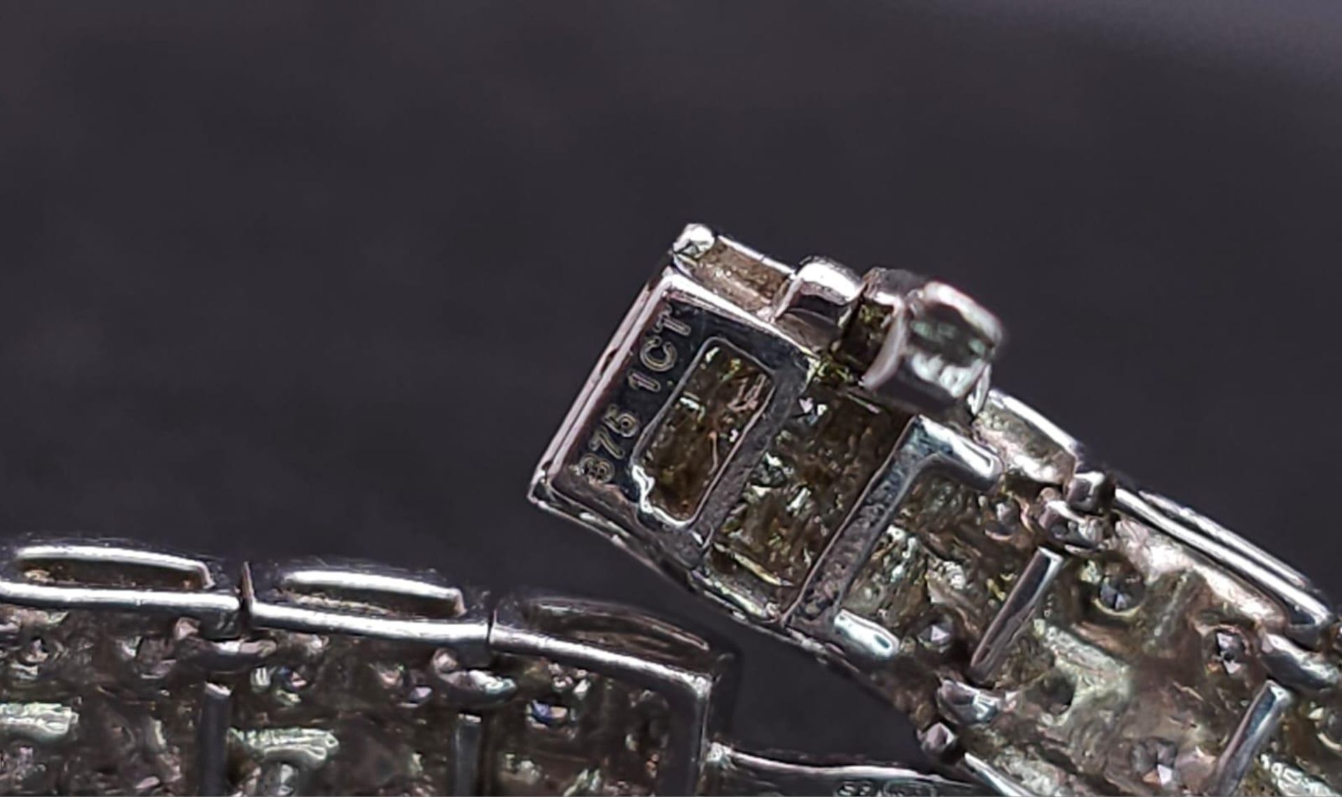 A 9K White Gold Diamond Set Bracelet, with Under Safety Catch Fitting. 1ctw, 19cm length, 12.7g - Image 14 of 14