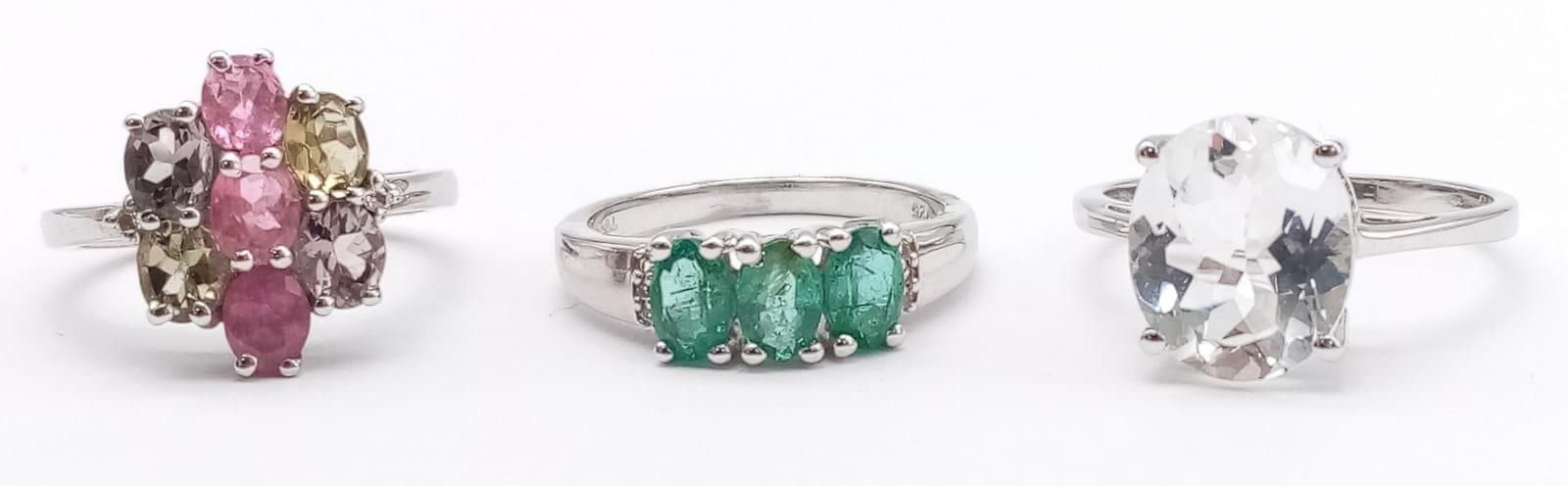 Three 925 Sterling Silver Gemstone Rings: Tourmaline - Size N, Topaz - Size S and Emerald - Size P.