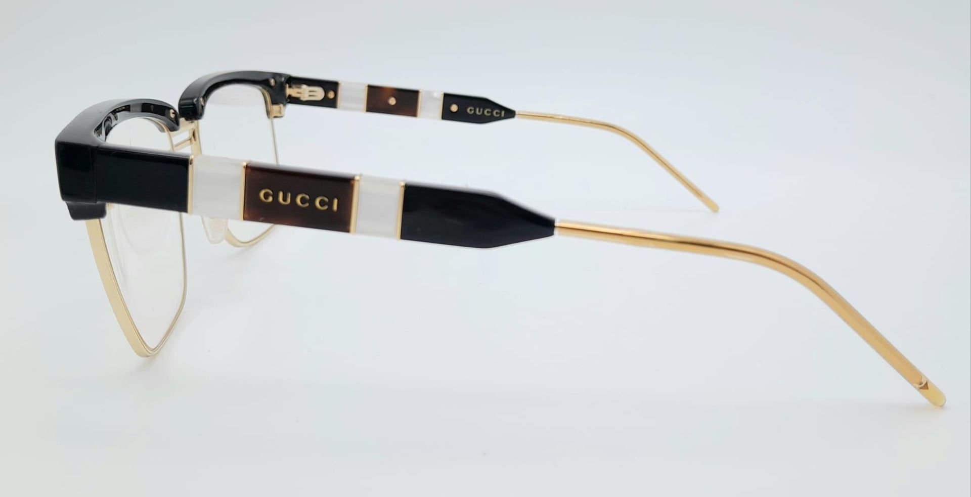 A GUCCI pair of glasses, gold plated in parts with mother of pearl highlights. Very stylish! - Image 3 of 5