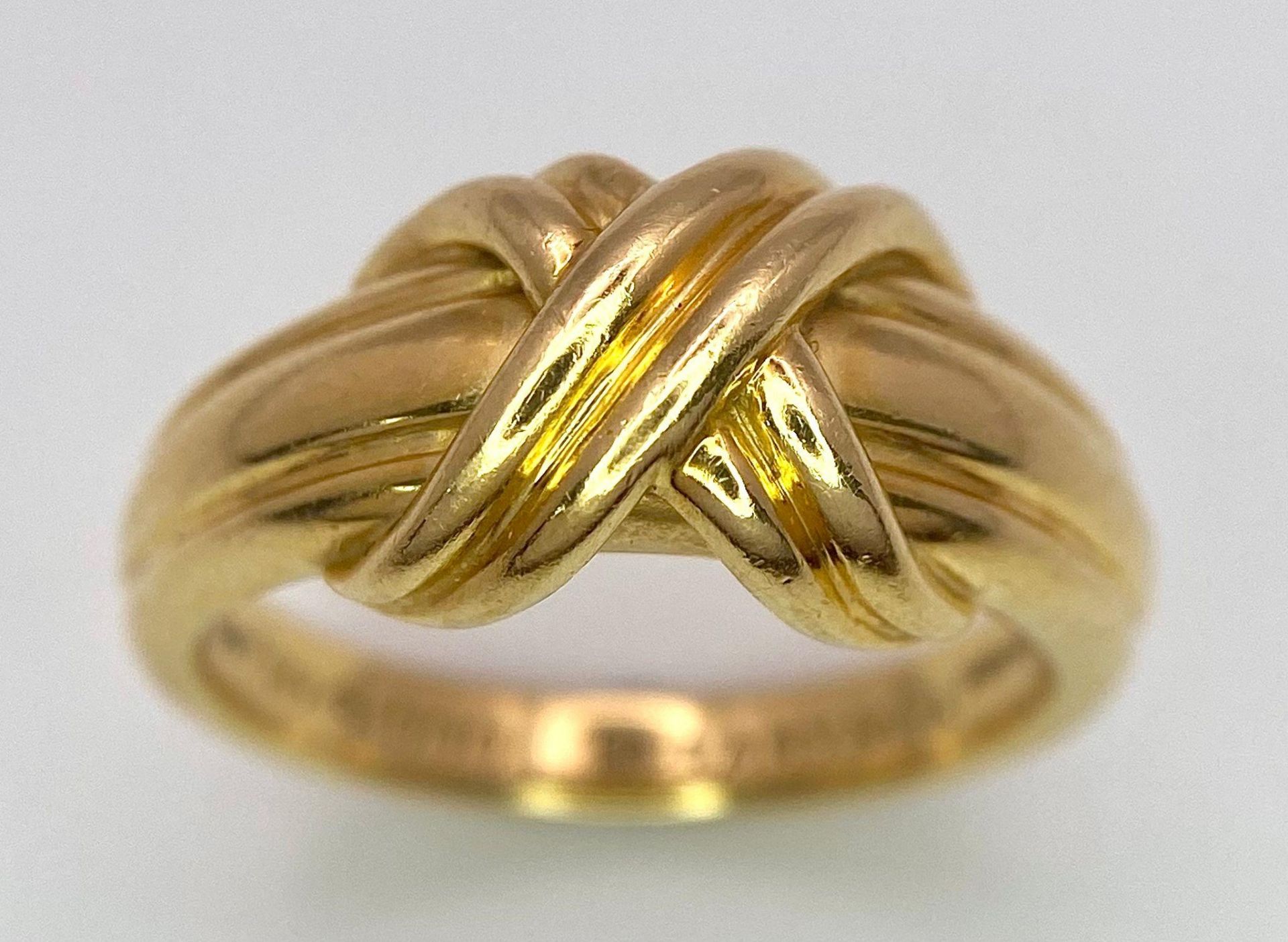 A Beautiful Tiffany and Co. 18K Gold Love Ring. Tiffany and co. markings. Size N. 7.2g weight. - Bild 2 aus 10