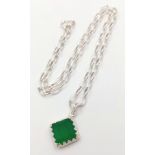 A sterling silver chain necklace with a synthetic emerald pendant, chain length: 42 cm, total