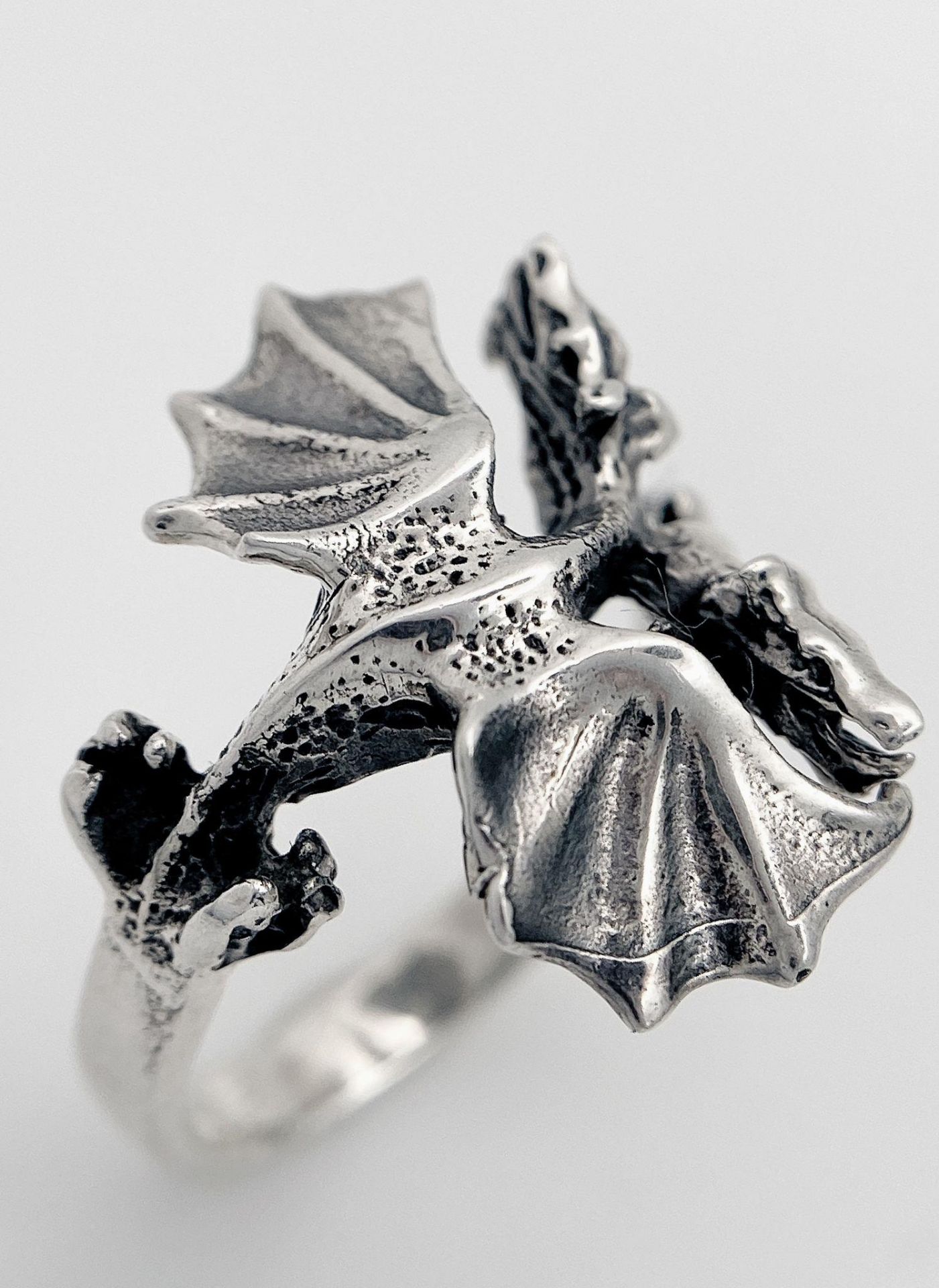 A Vintage Sterling Silver Dragon Detail Ring Size K. The Crown is detailed with a Dragon with