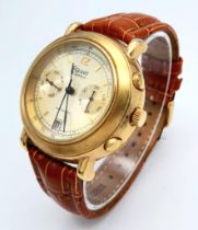 A Stauer 27 Jewels Automatic Gents Watch. Brown leather strap. Gilded stainless steel case - 42mm.
