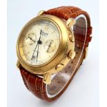 A Stauer 27 Jewels Automatic Gents Watch. Brown leather strap. Gilded stainless steel case - 42mm.