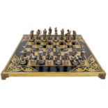 A Greek Made Bronze and Enamel Chess Set and Board. As new, in original packaging.