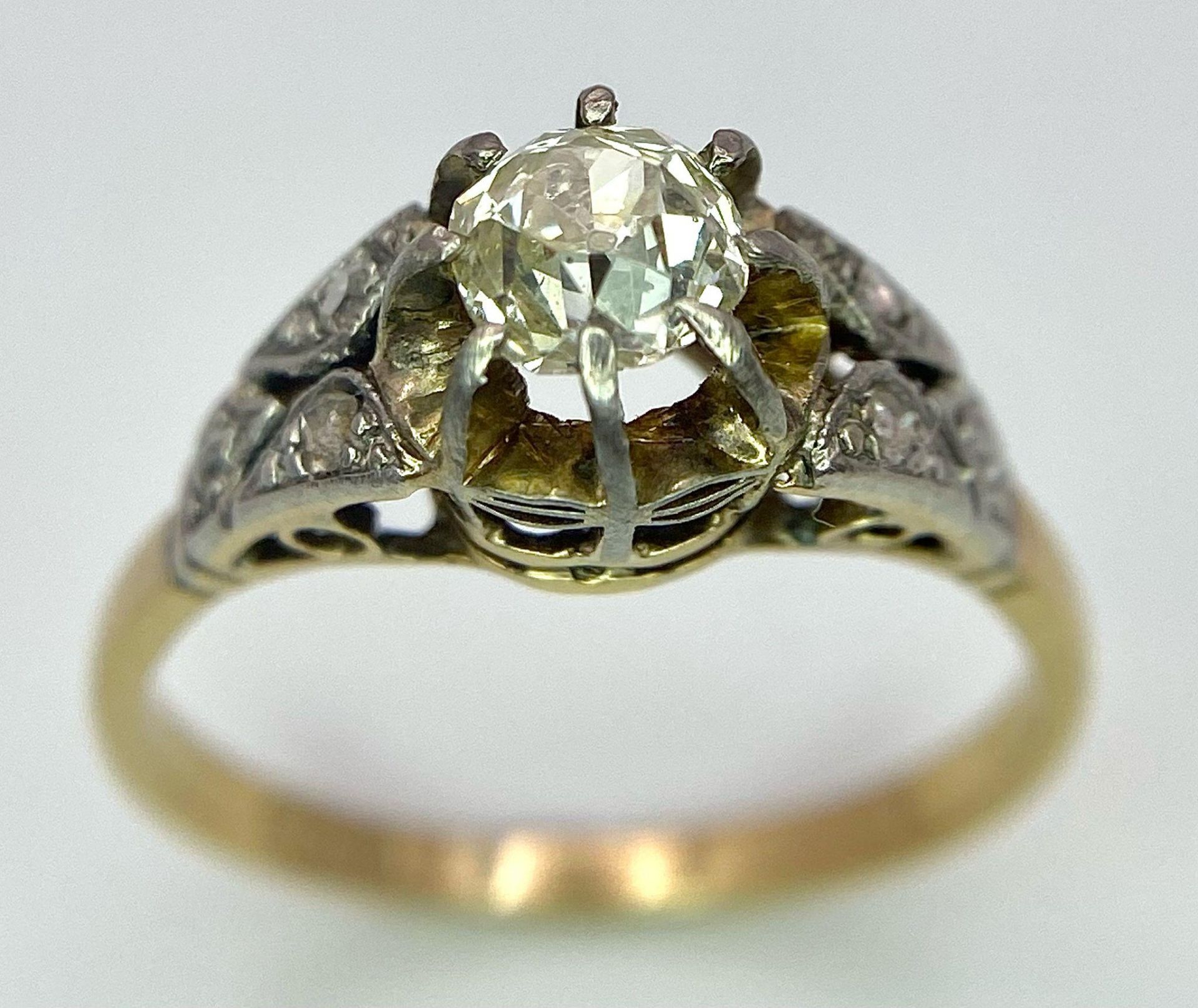 An Antique 18K Gold, Platinum and Diamond Ring. Central 0.75ct central stone with diamond accents on - Image 3 of 7