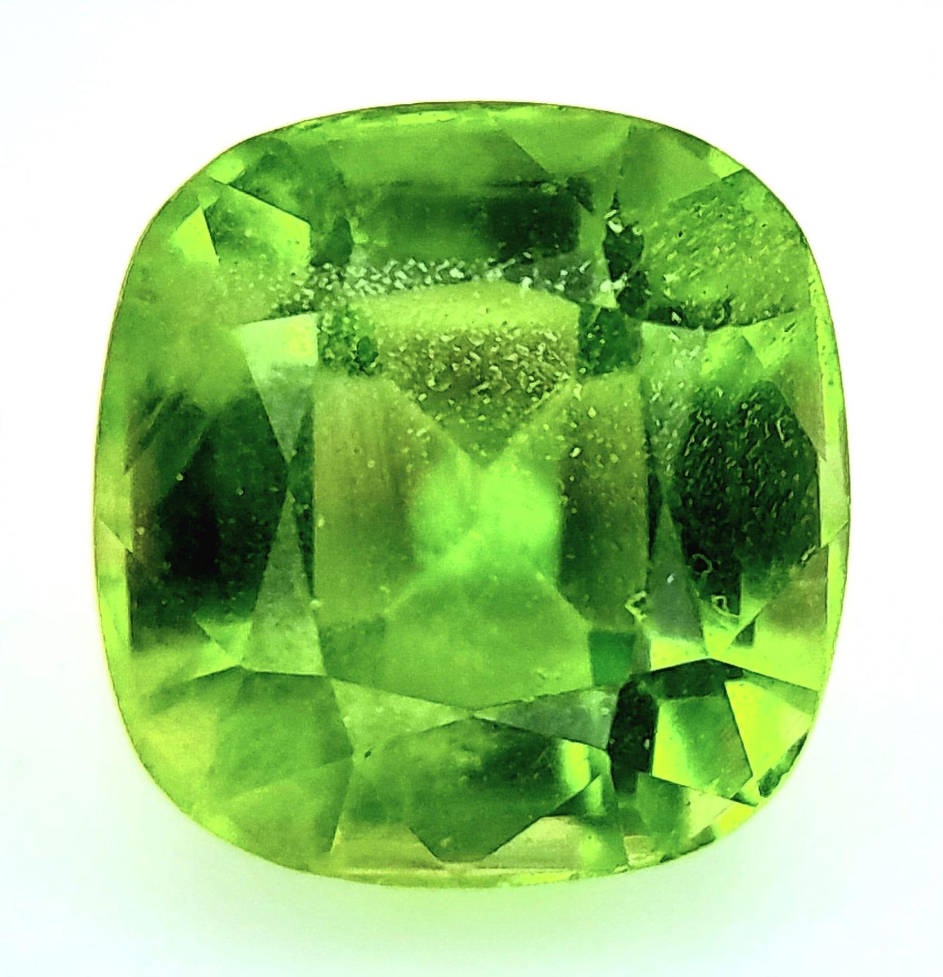 A 2.34ct Pakistan Natural Peridot Gemstone, Cushion cut. Comes with the GFCO Swiss Certificate. ref: