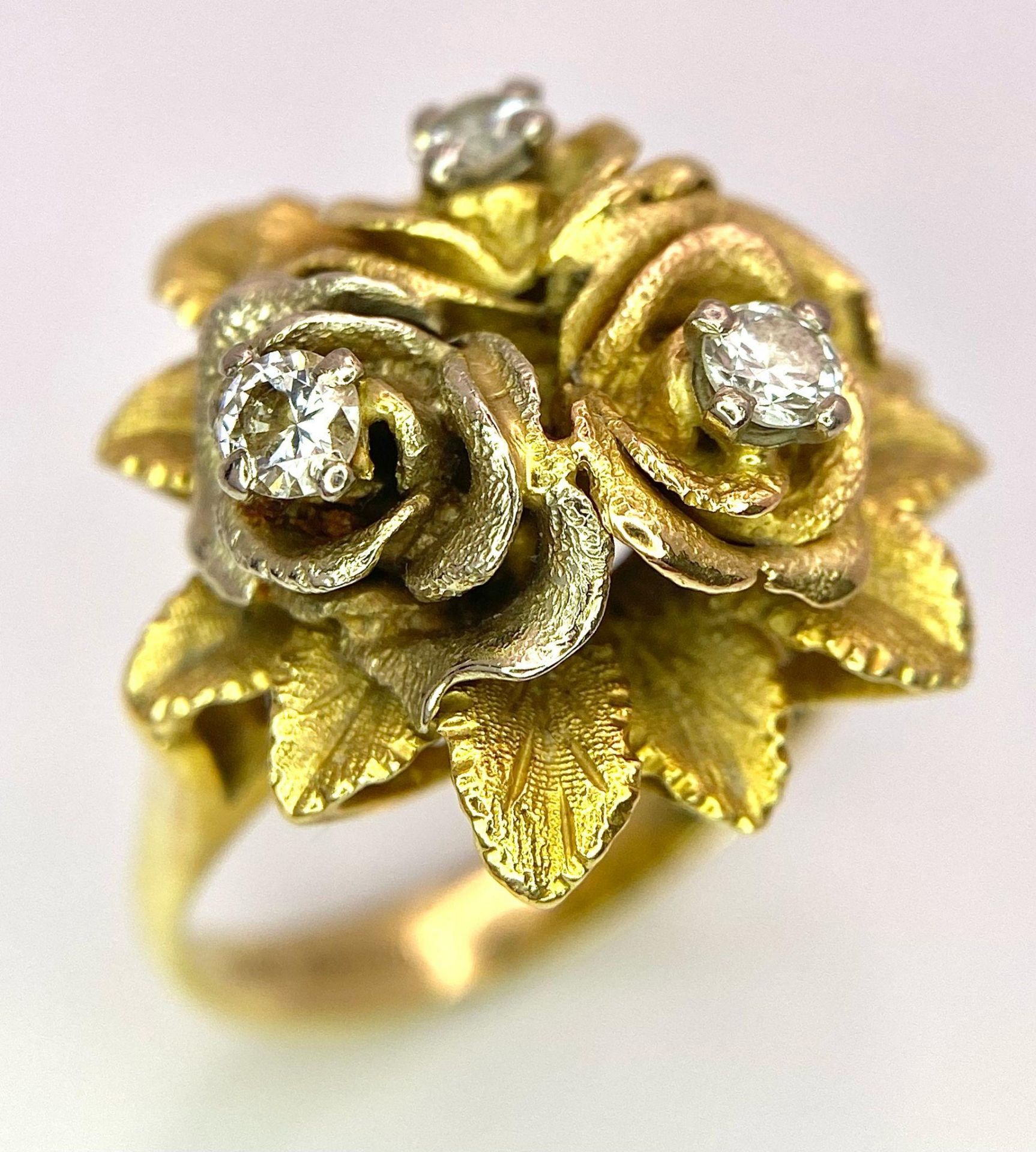 An 18K Yellow Gold and Diamond Floral Design Ring. A rich cluster of golden petals give sanctuary to - Image 2 of 9