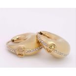 A gold plated DIOR pair of earrings with cubic zirconia. Dimensions: 21 x 22 x 10 mm.