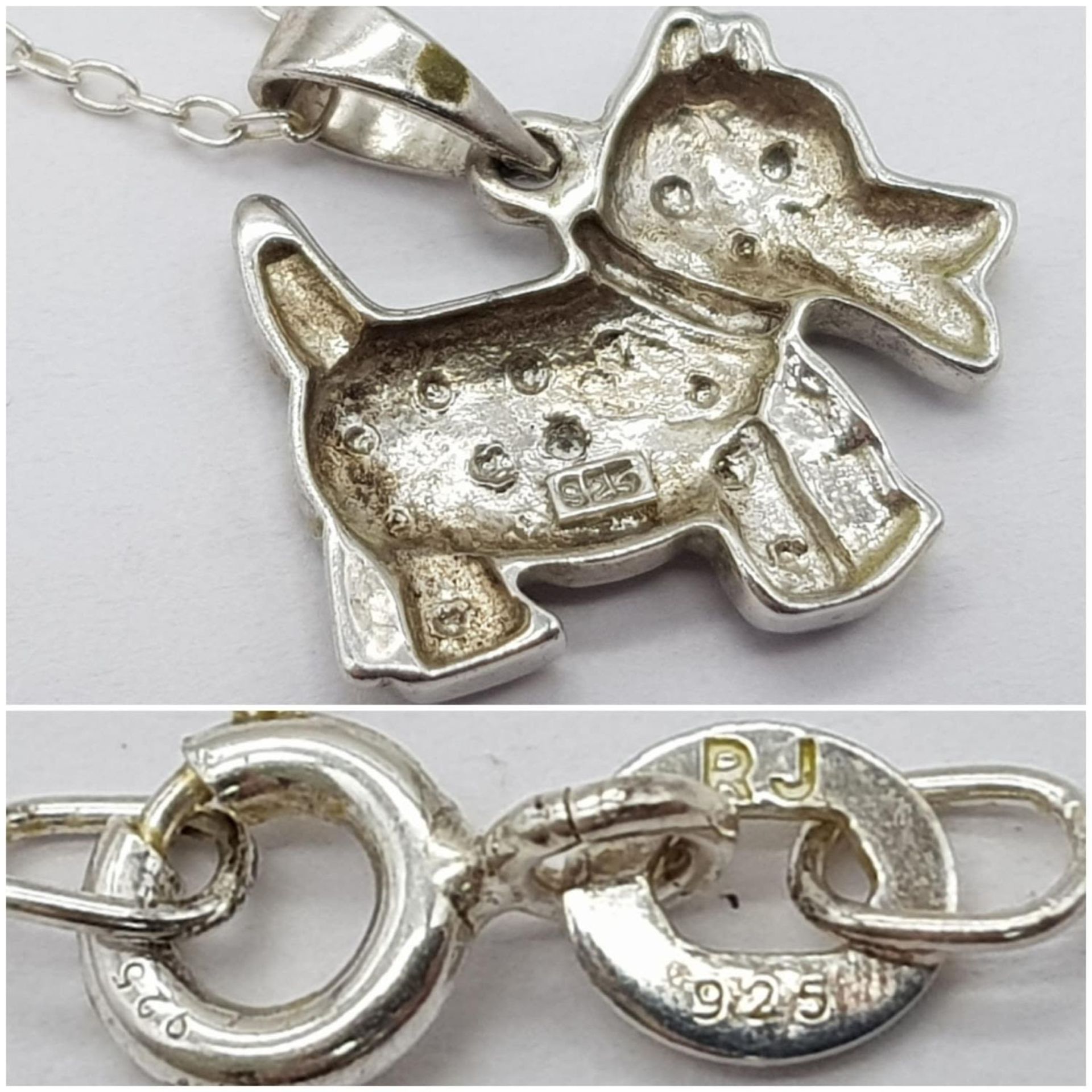 A fancy 925 silver stone set dog pendant on silver chain. Total weight 2.2G. Total length 46cm. - Image 5 of 5