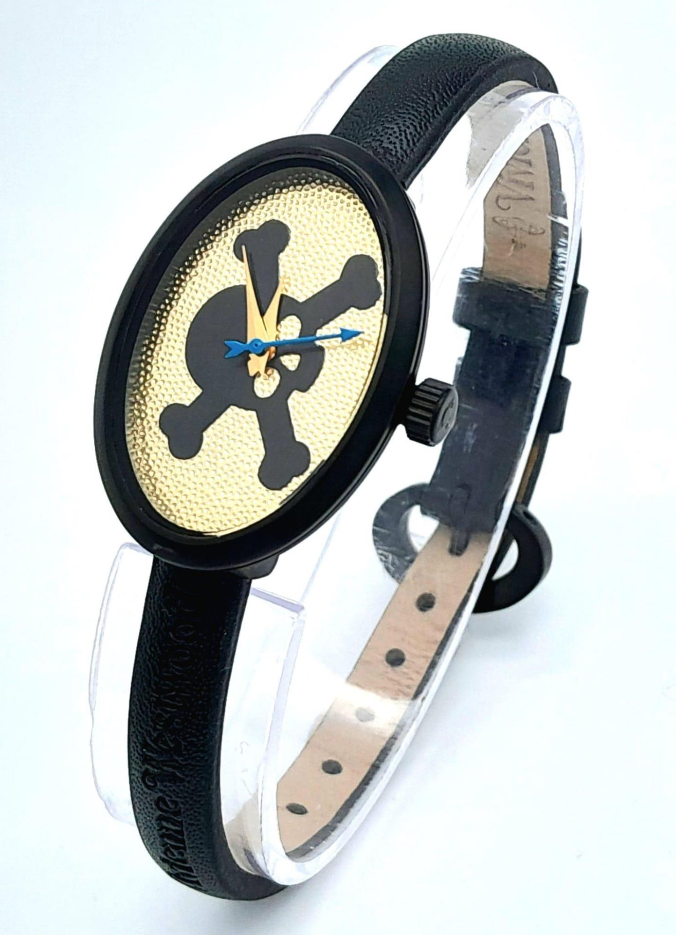 A Vivienne Westwood Skull and Crossbone Watch. Oval case - 22mm. In working order.