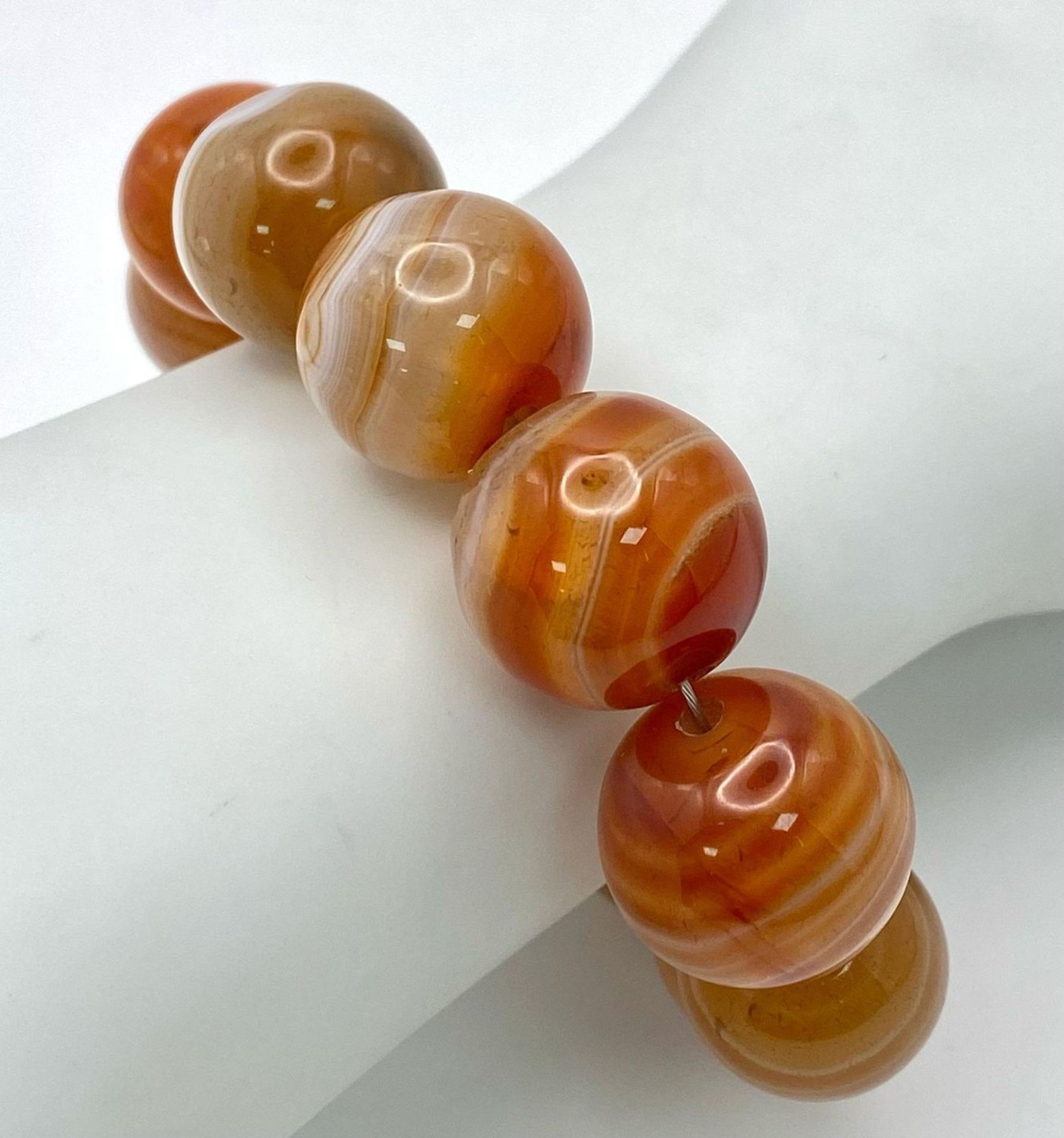 A Large Beaded Orange Banded Agate Bracelet. 15mm beads. 16cm. - Bild 2 aus 4