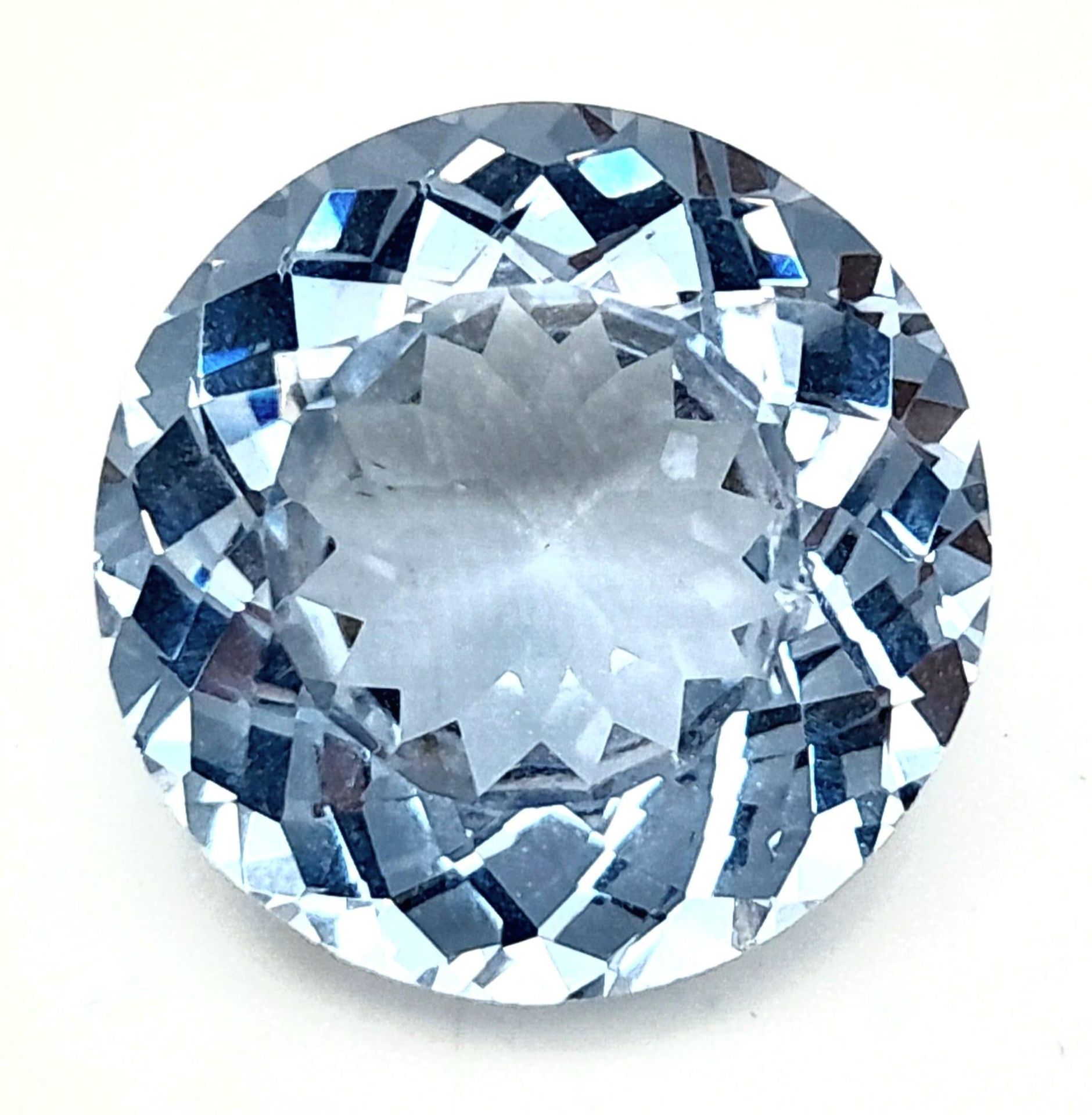 A 16ct Sumptuous Aqua Marine Coloured Gemstone. Round cut. No certificate so as found.