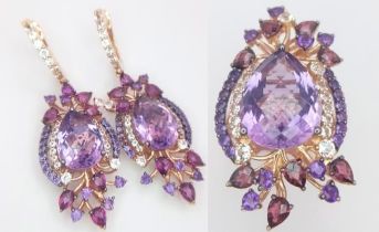 A stunning LE VIAN design, 14 K rose gold ring and earrings set with large pear shaped amethysts and