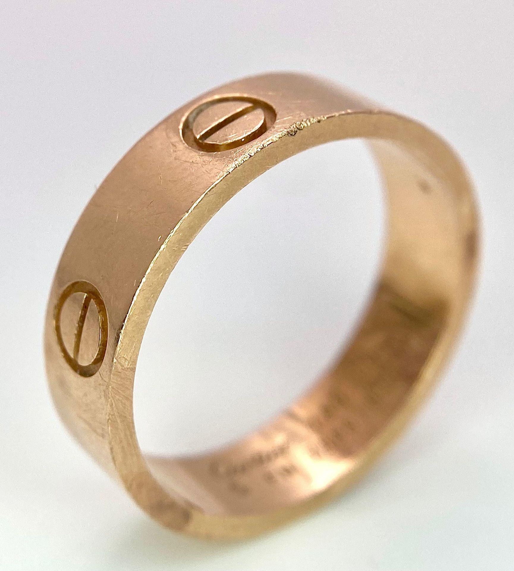 A Cartier 18K Rose Gold Love Band Gents Ring. 6mm width. Cartier hallmarks. Size W. 8.6g weight. - Image 3 of 9