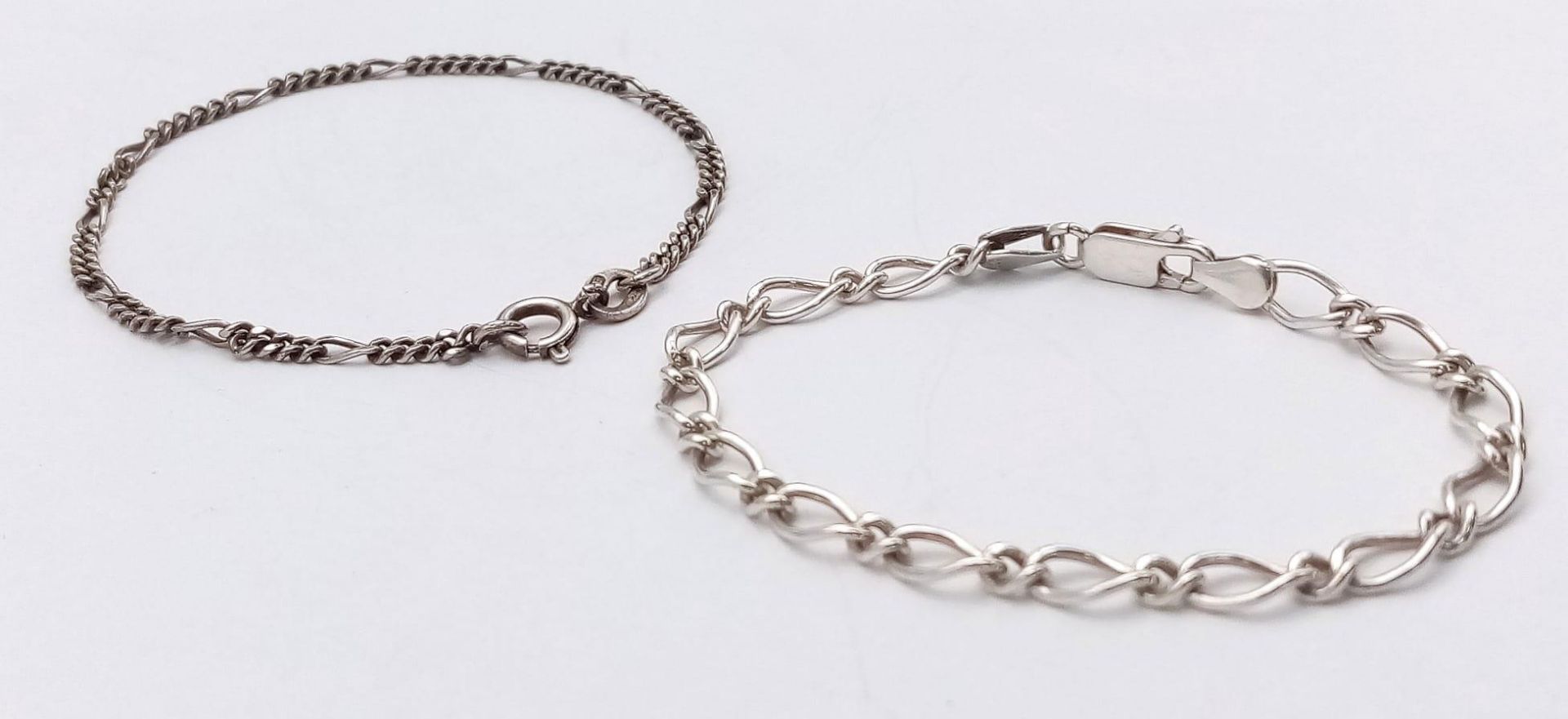 2X stylish 925 silver curb and figaro link bracelets. Total weight 7.5G. Total length 17cm and 18cm. - Image 2 of 7