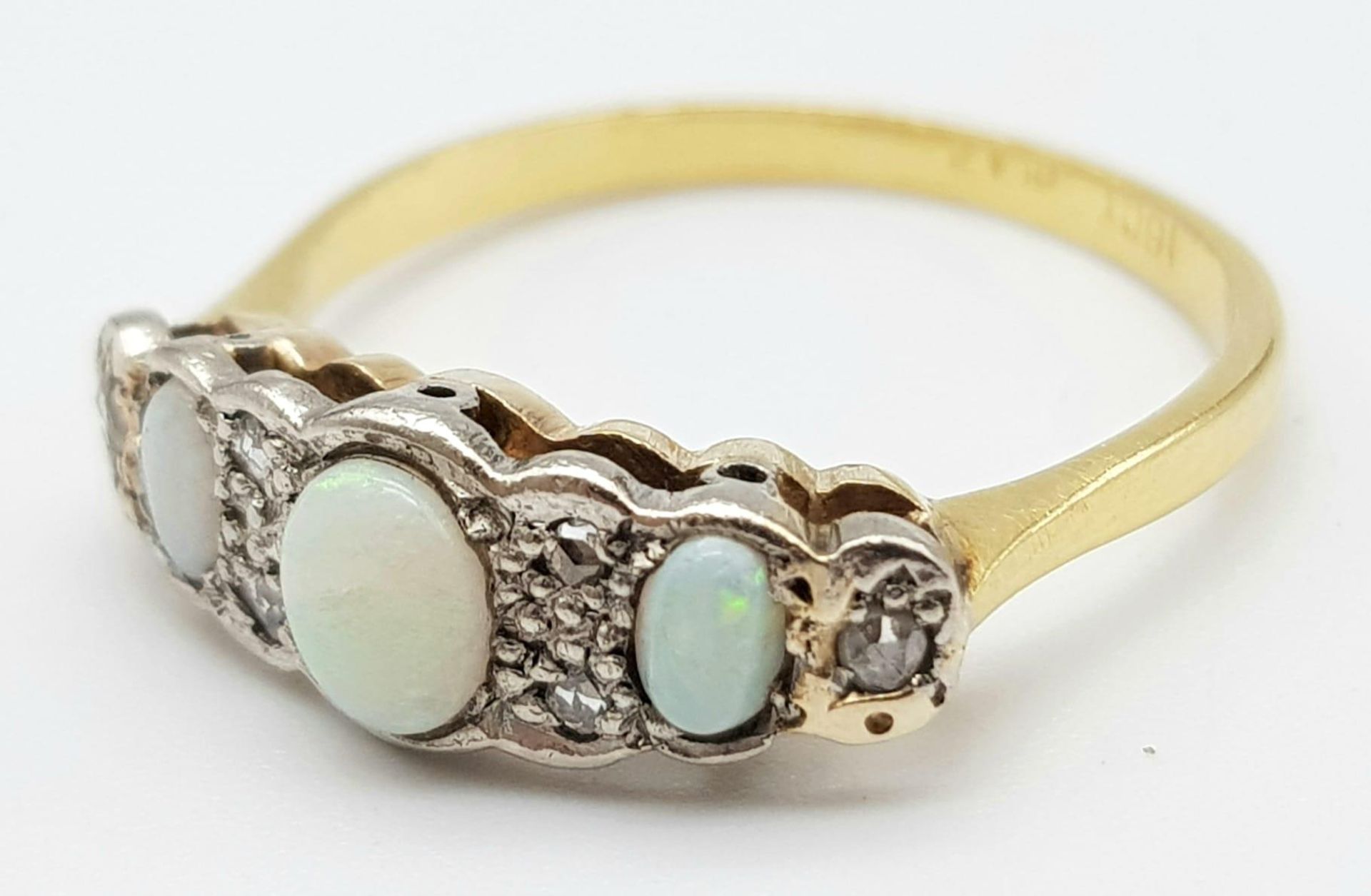 An Antique Opal and Diamond 18K Yellow Gold Ring. Three opals with diamond accents. Size O. 2.72g - Image 3 of 5